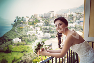 Portrait of a young smiling bride