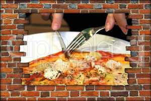 broken brick wall and view to fork knife and tasty pizza