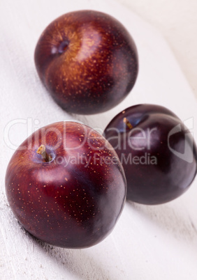 Fresh ripe red plums