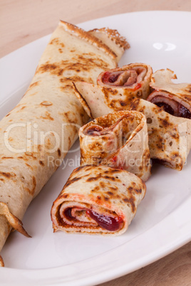 Sweet Rolled Pancakes on Plate