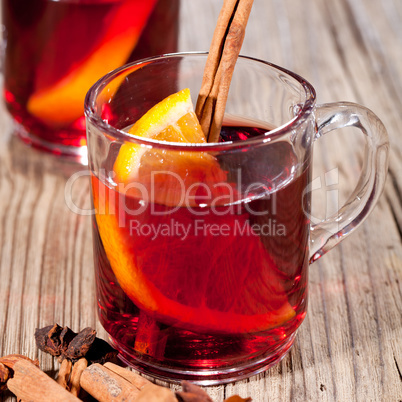 hot tasty spicy mulled red wine with orange and cinnamon christmas