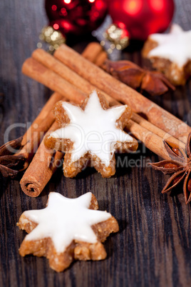 fresh tasty christmas cinnamon cookies and sticks decoration