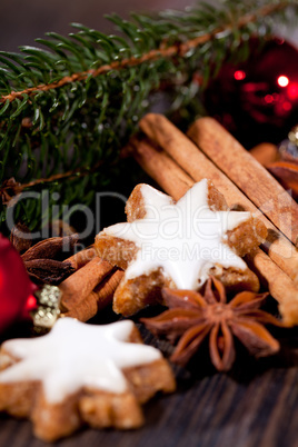 fresh tasty christmas cinnamon cookies and sticks decoration