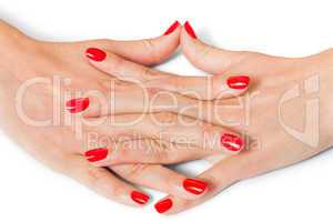 Woman with beautiful manicured red fingernails