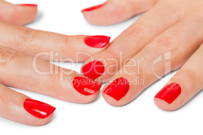 Woman with beautiful manicured red fingernails