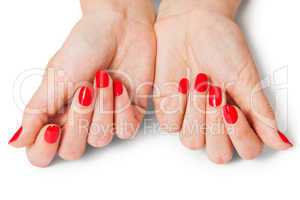 Woman with beautiful manicured red fingernails