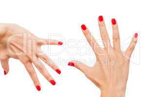 Woman with beautiful manicured red fingernails