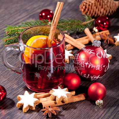 hot tasty spicy mulled red wine with orange and cinnamon christmas