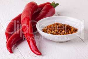 Fresh red and yellow chili peppers with spice