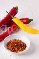 Fresh red and yellow chili peppers with spice