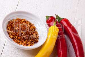 Fresh red and yellow chili peppers with spice