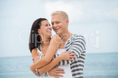 smiling young couple having fun in summer holiday