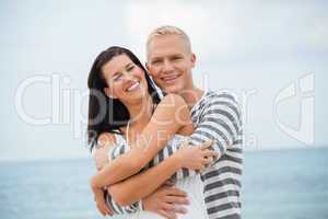 smiling young couple having fun in summer holiday