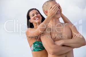 smiling young couple having fun in summer holiday