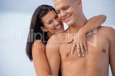 smiling young couple having fun in summer holiday