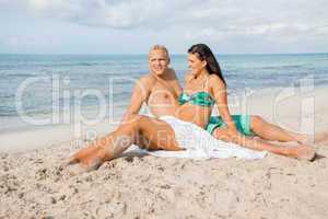 Happy young couple sunbathing