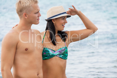 smiling young couple having fun in summer holiday