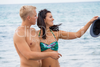 smiling young couple having fun in summer holiday