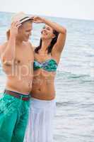 smiling young couple having fun in summer holiday