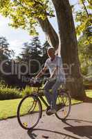 Senior Man Riding Bicycle