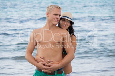 smiling young couple having fun in summer holiday