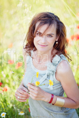 adult brunette woman smiling in summertime outdoor