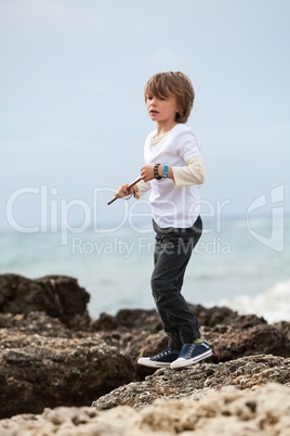young little boy child playing outdoor sea beach vacation