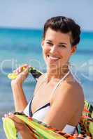 Beautiful vivacious woman at the seaside