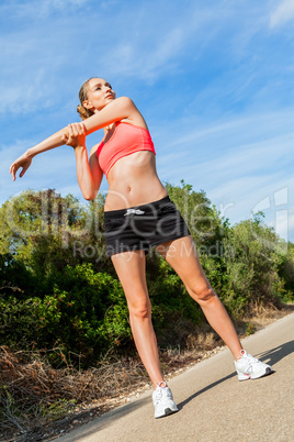 young attractive athletic woman stretching fitness