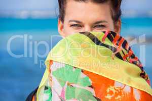 Beautiful vivacious woman at the seaside