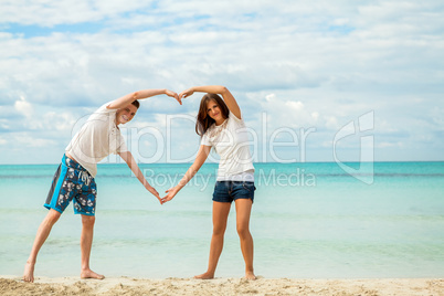 smiling young couple having fun in summer holiday