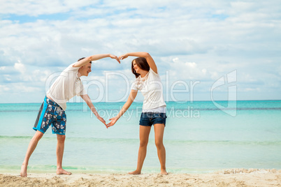 smiling young couple having fun in summer holiday