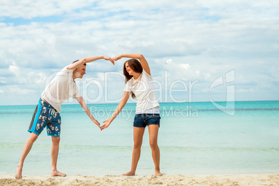 smiling young couple having fun in summer holiday