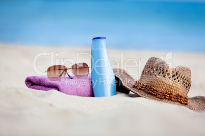 sunprotection objects on the beach in holiday