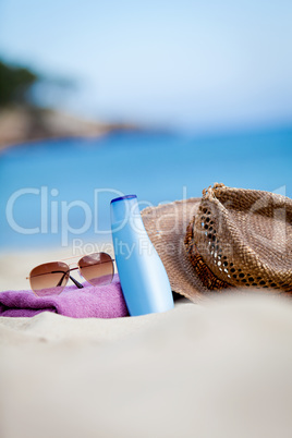 sunprotection objects on the beach in holiday