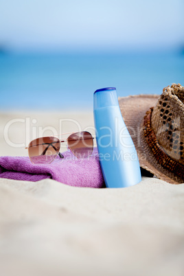 sunprotection objects on the beach in holiday