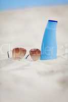 sunprotection summer holiday sunglasses and cream