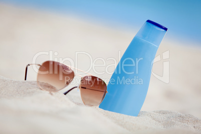 sunprotection summer holiday sunglasses and cream