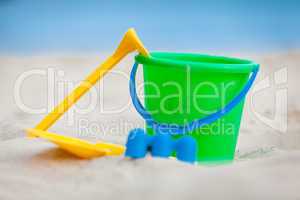 plastik colorful toys in sand on beach