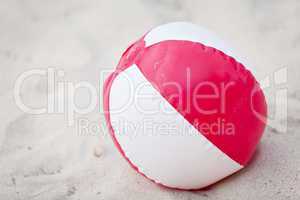 beach ball in sand on the beach summertime holiday