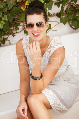 attractive brunette woman with sunglasses and red lips