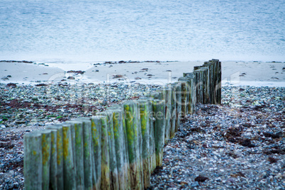 baltic sea background evening wooden wave breaker beach