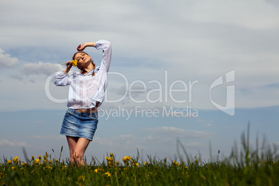 young woman is happy outdoor in summer