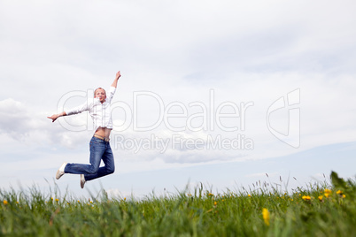 young man outdoor in summer in nature happy