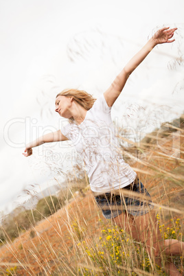 young happy attractive woman arms wide open