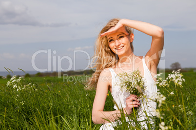 beautiful blonde woman outdoor in summer happy