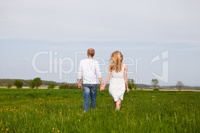 young happy couple have fun in summer