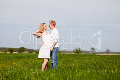 young happy couple have fun in summer