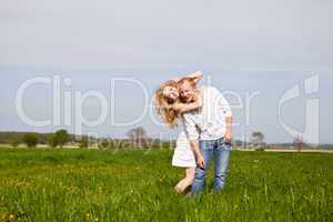 young happy couple have fun in summer
