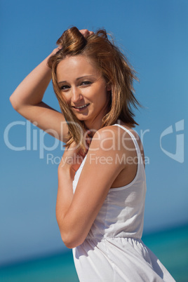 beautiful happy woman on the beach lifestyle summertime